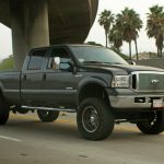 Photo of a large grey pickup truck on a California highway