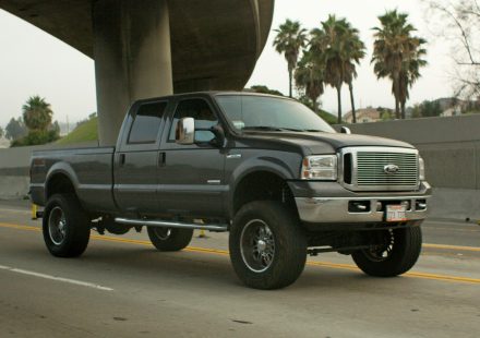 Photo of a large grey pickup truck on a California highway