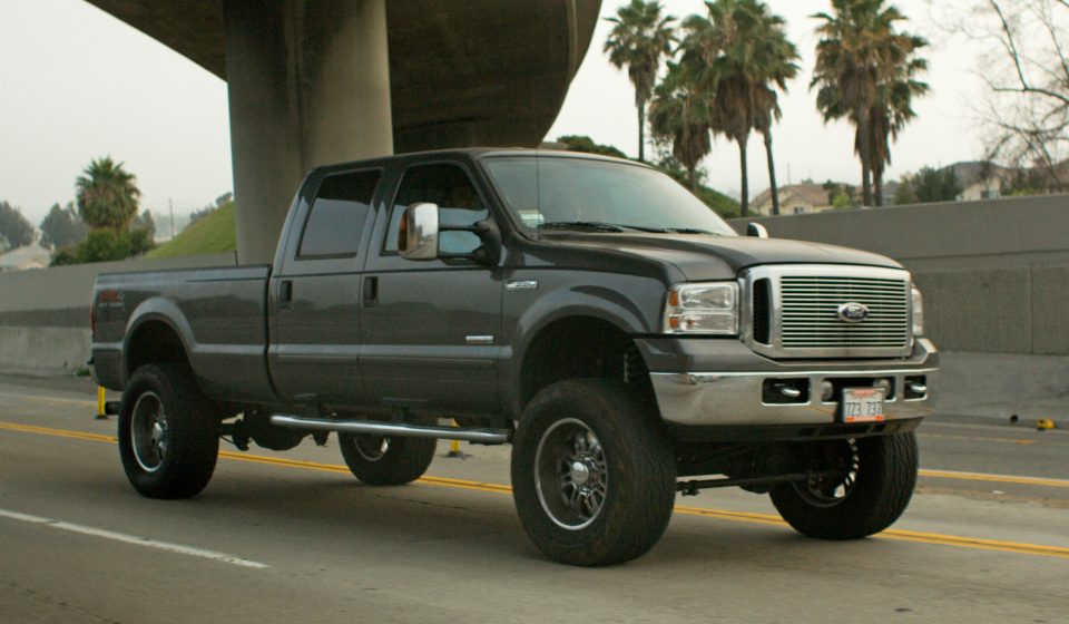 Photo of a large grey pickup truck on a California highway